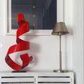 Escultura roja de metal: arte contemporáneo para transformar su espacio
